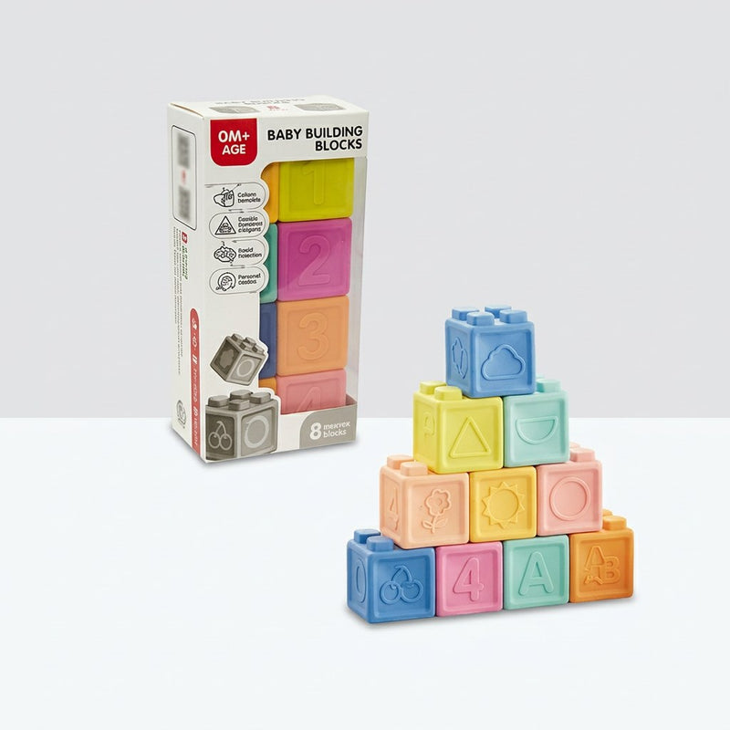 Baby Building Blocks compact box, 7.7 x 18.9 x 3.7cm, pastel-coloured cubes visible through the window