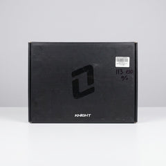 The closed matt-black box with the Knight logo on the lid