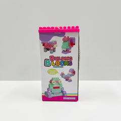 Side panel of the Building Blocks tower box, showing printed block builds of a bird and a robot