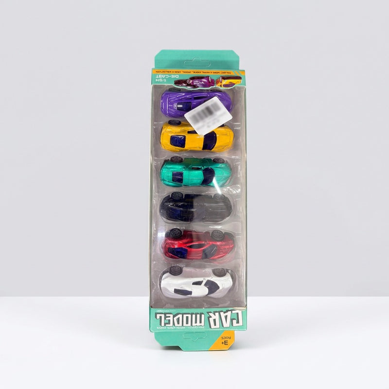 Six 1:64 die-cast cars in their blister pack, white, red, purple, green, yellow and purple