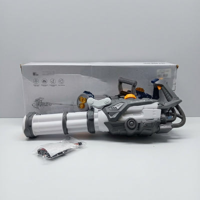 Gatling-style toy blaster with three bundled barrels, shown in front of its box