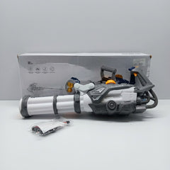 Gatling-style toy blaster with three bundled barrels, shown in front of its box