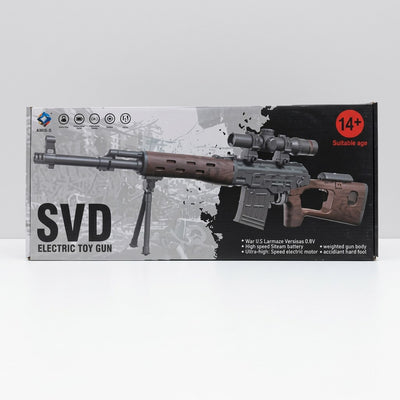 Electric toy sniper rifle in its box, with a mounted scope, folding bipod and 14+ age badge printed on the packaging