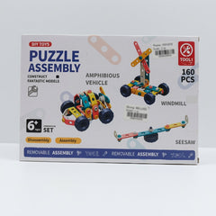 Construction set box front, Puzzle Assembly, 160 pieces, Amphibious Vehicle, Windmill and Seesaw models, age 6+ badge
