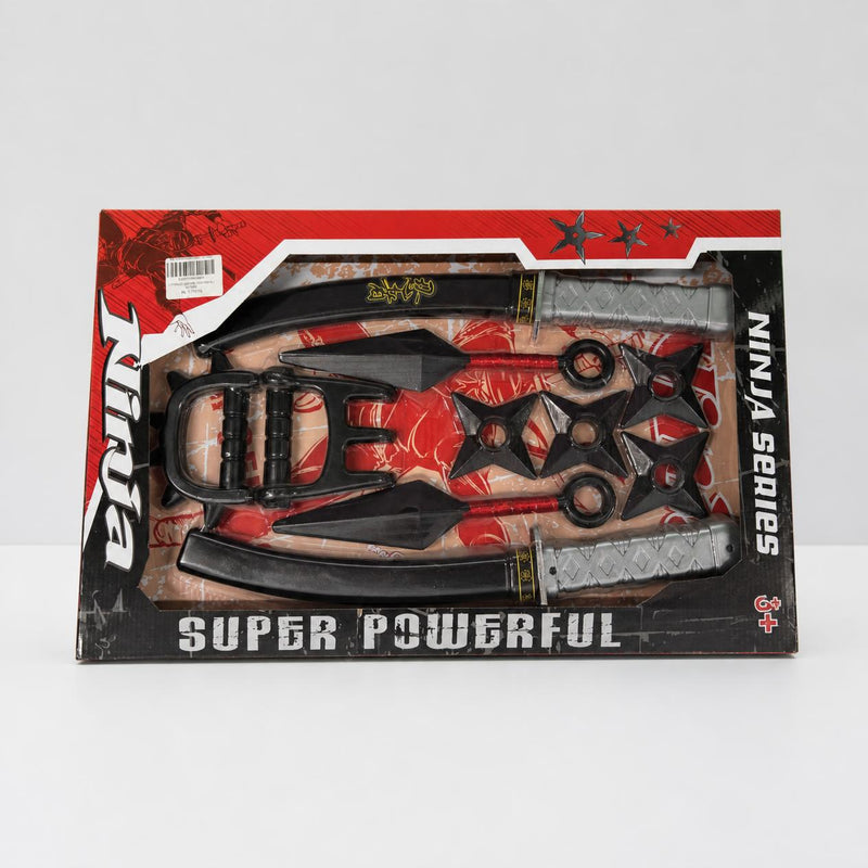 Ninja Series weapon set on its card, swords, stars and ring blades laid out in the blister