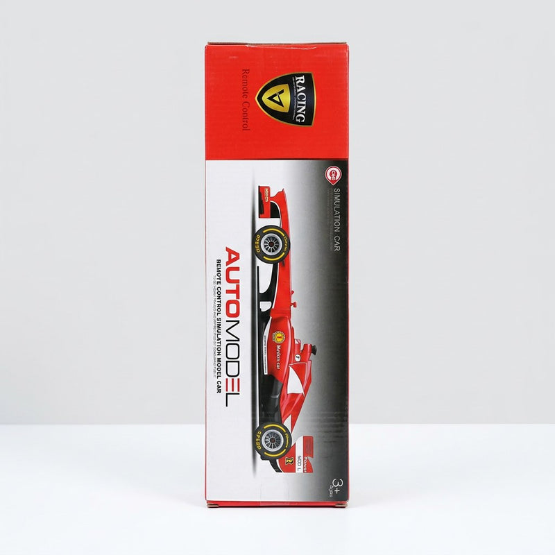 AUTO MODEL box front, red open-wheel race car with rear wing and racing decals, 3+ Ages badge