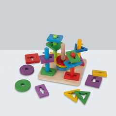 Wooden stacking toy, five coloured posts fixed to a wooden base, each threaded with wooden shape pieces