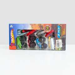 Window box showing four monster trucks and four ejectors behind clear plastic