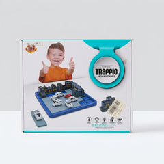 Traffic Board Game box front, showing a child giving thumbs up and the board with buildings, cars and one red car