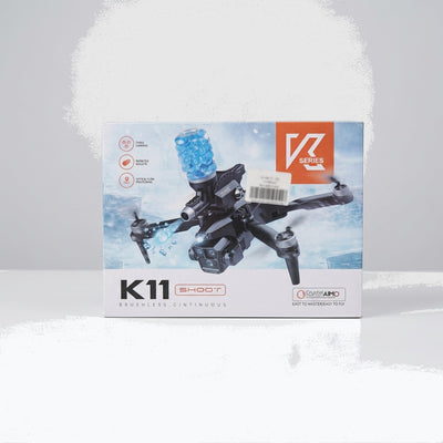 K11 Shoot drone box front, black quadcopter with the gel-bead blaster magazine on top