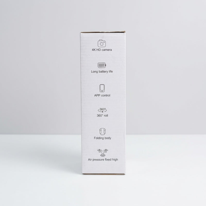 Box side panel printed with the feature icons - 4K HD camera, long battery life, APP control, 360 roll, folding body