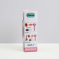 Reverse of the box with the shop price sticker and a child using the hairdryer