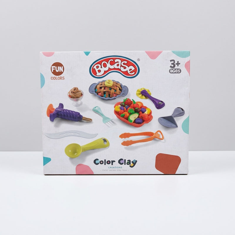 Bocase Color Clay box front, with a woven pie mould, a fruit tray and dough-shaping tools