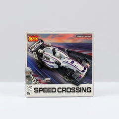White and purple building-block race car box, front panel showing the built open-wheel car with a helmeted driver minifigure, 157pcs 6+
