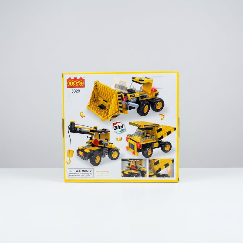 Yellow building-block construction truck box, back panel showing the 3-in-1 alternate builds and the choking-hazard warning