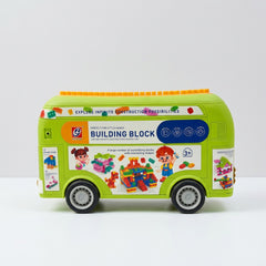Green toy bus-shaped block storage case with "Building Block" branding and a 3+ age badge on its side