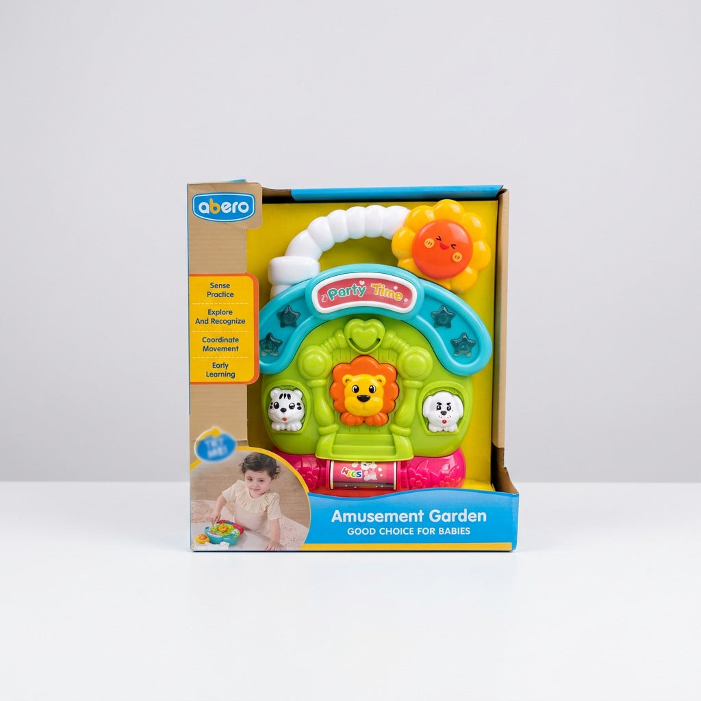 The open box showing the teal activity panel, sunflower, lion key and white bead arc