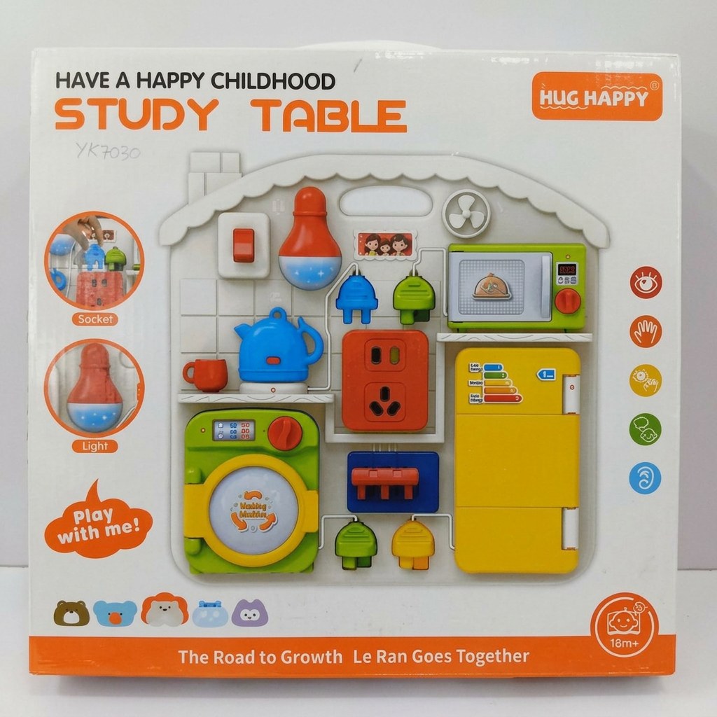 Busy Board Study Table box front, house-shaped sensory panel with socket, light, washing machine and fridge, 18m+ badge