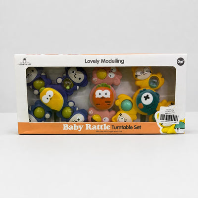 Baby Rattle Turntable Set box front, character rattles in an open window with the shop sticker