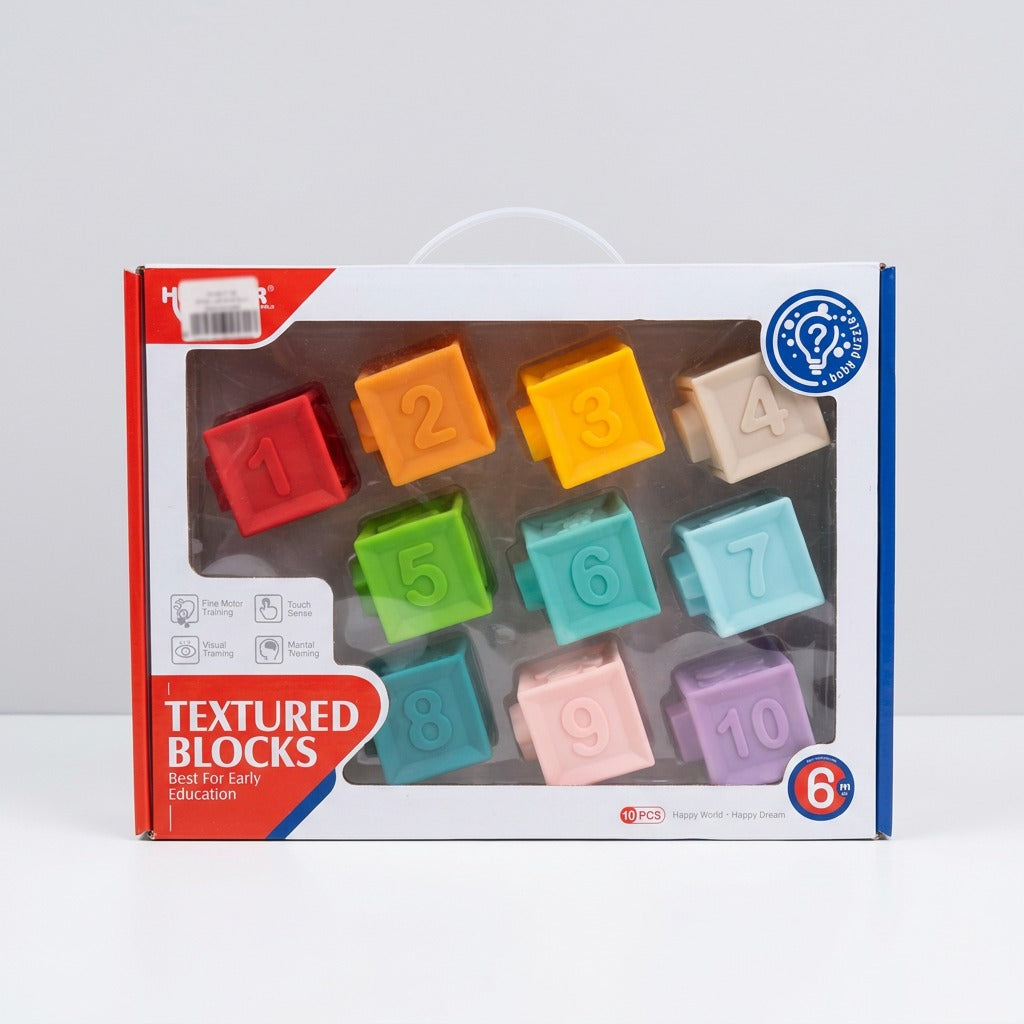 Ten soft textured blocks numbered 1 to 10 in the box window, each a different colour