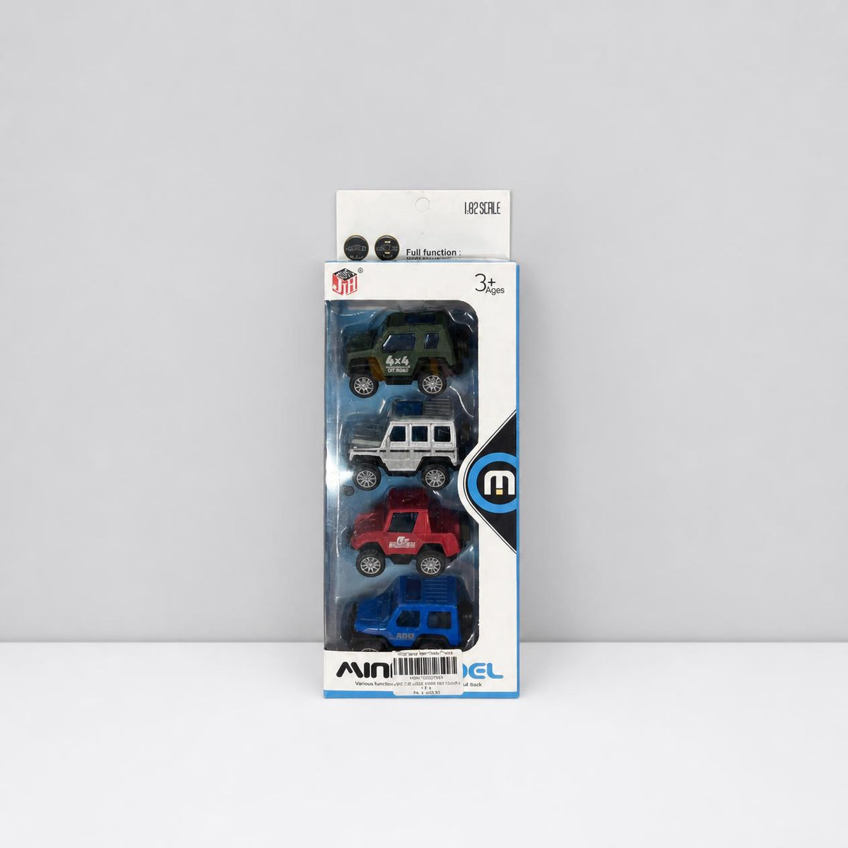 Mini Model pull-back pickup card front, four trucks behind a clear blister