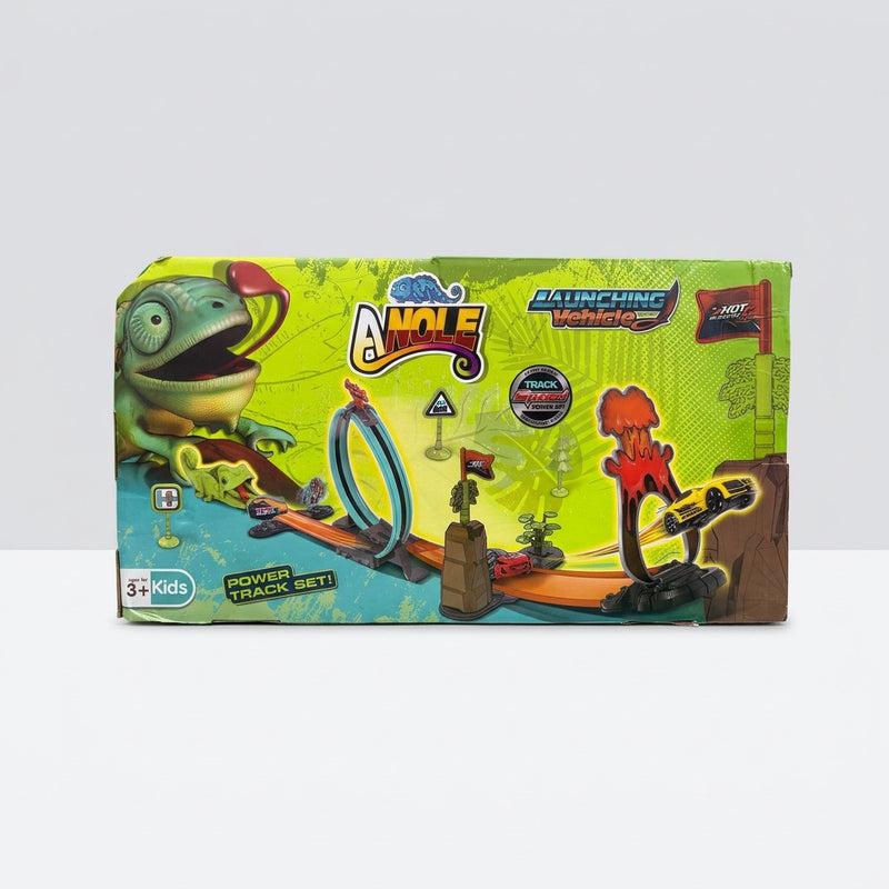 Close-up of the chameleon launcher mouth, a red car and the 32 PCS badge