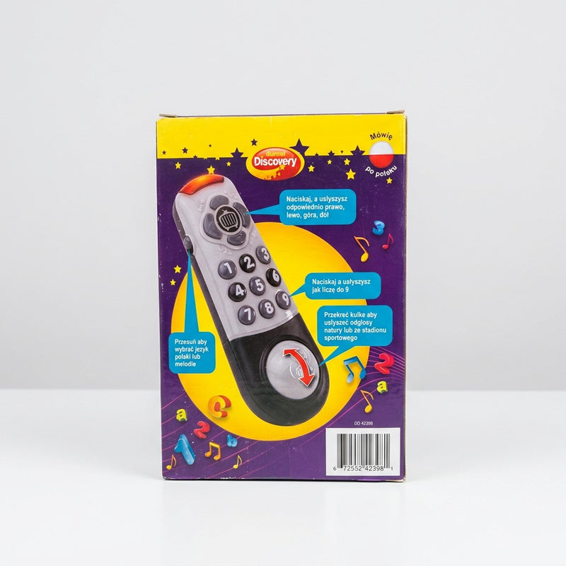 Angled view of the box showing the toy remote standing in its tray