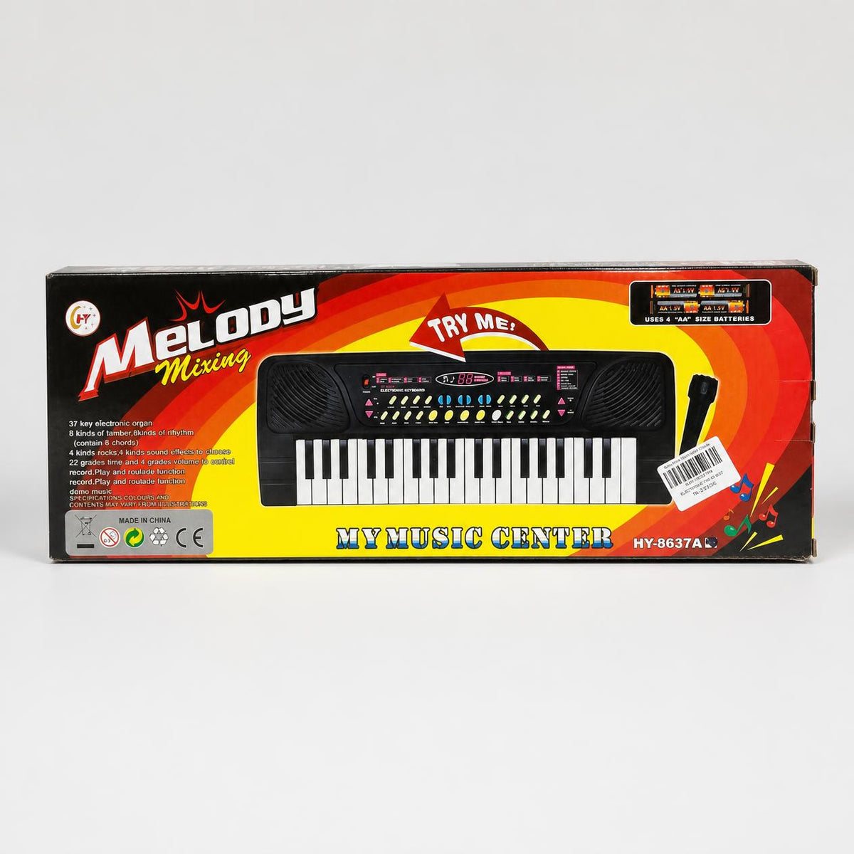 Melody Mixing box front showing the 37-key keyboard, the microphone and the TRY ME arrow