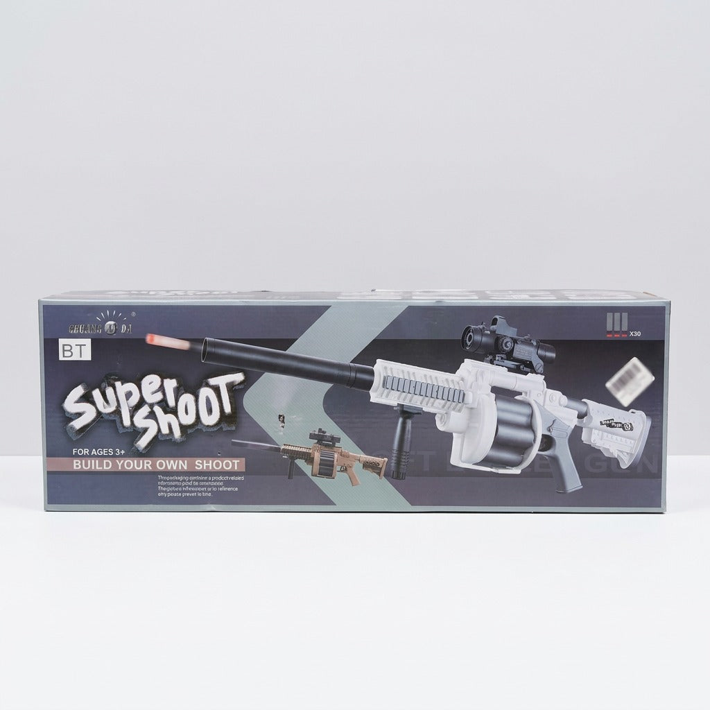 Super Shoot soft dart gun on the box front, built up with scope and silencer