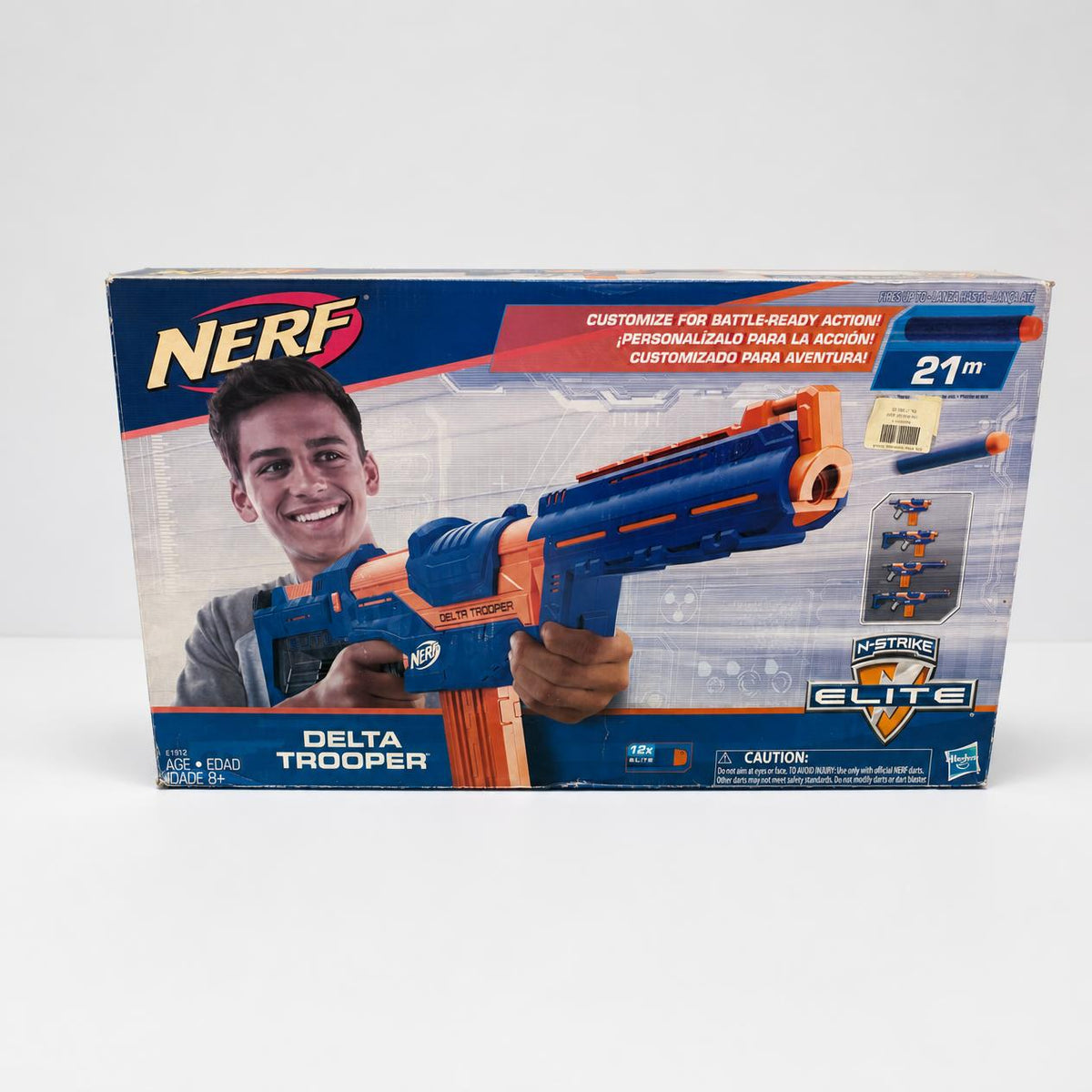 NERF Delta Trooper box front showing the blue blaster and the 21m badge