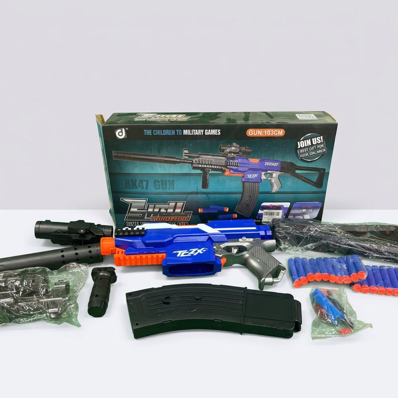 Second view of the unpacked rifle with the silencer, magazine and bullet bags
