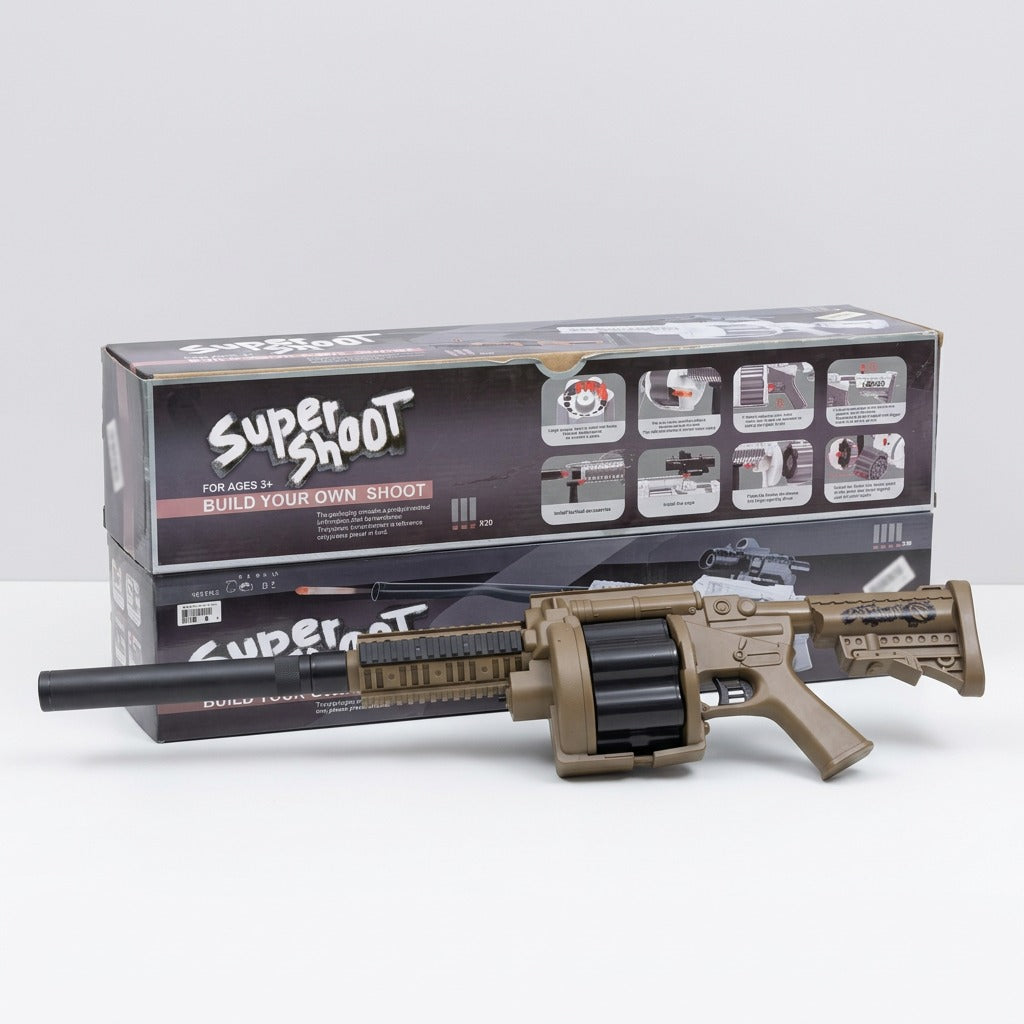 The tan gun lying in its open box with the silencer, scope and darts beside it