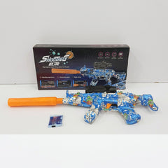 Blue-and-white camo water gel blaster rifle beside its box and a small gel ball refill pack