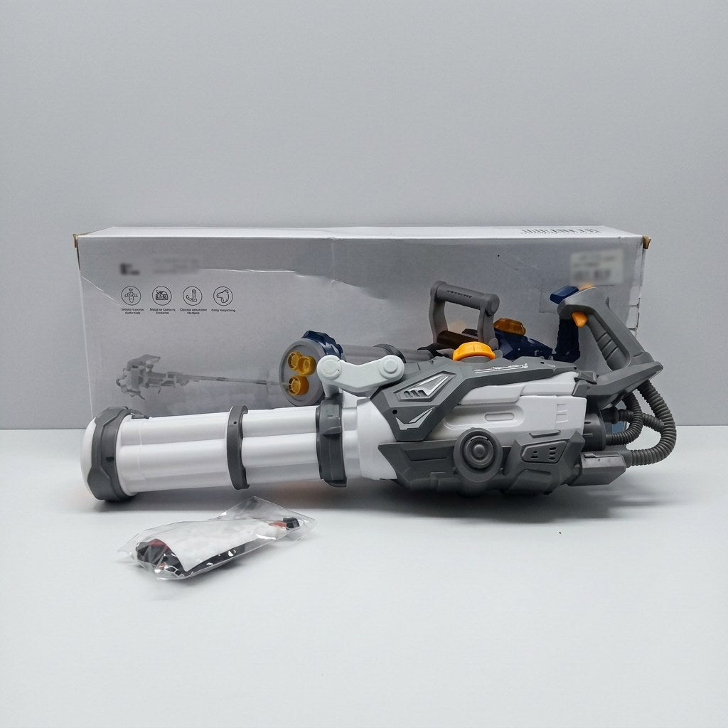 Gatling-style toy blaster with three bundled barrels, shown in front of its box