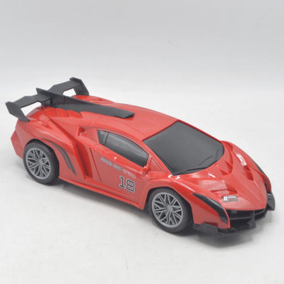 High-Speed Remote Control Sports Car in red, three-quarter view showing the rear wing and wide wheel arches
