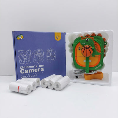Blue box printed “Children's fun Camera”, “KIDS CAMERA”, with six print paper rolls in front