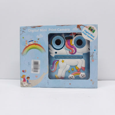 Box front for a unicorn-shaped digital mini print camera, blue packaging with rainbow and cloud artwork