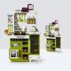 Green play kitchen stand with stove, oven window, sink and wheeled glass-front cabinet, next to its Western Kitchen box insert showing the 3+ age badge