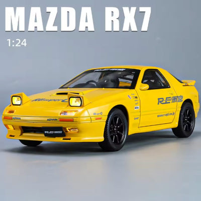 Mazda RX-7 die-cast model in yellow, 1:24 scale, R.E Amemiya livery