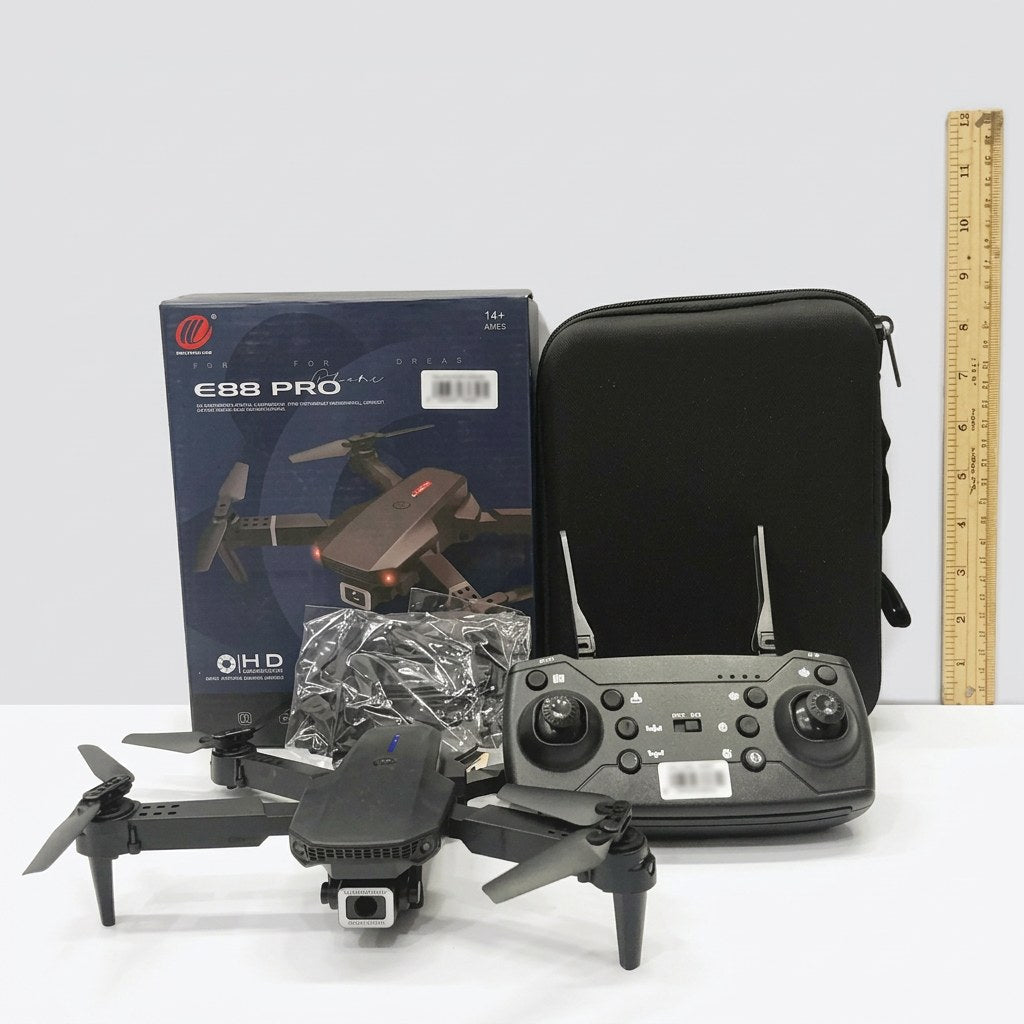 Drone box front, HD dual-camera badge, 14+ AGES roundel, red logo