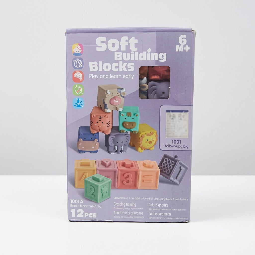 Soft Building Blocks box front, 6M+ badge, 12 PCS, animal and number block illustrations