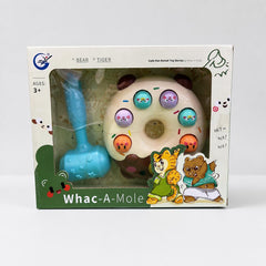 Whac-A-Mole box front with the cream doughnut, its six mole faces and the blue hammer
