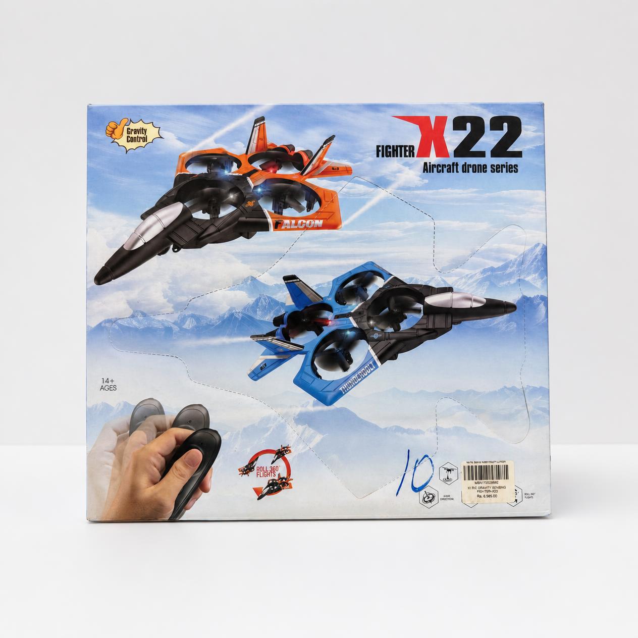 Fighter X22 box front showing the orange and blue jets and the hand holding the small remote