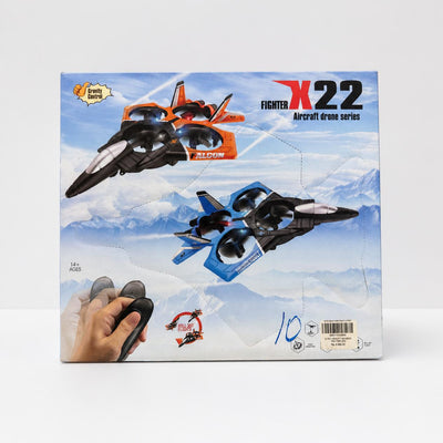 Fighter X22 box front showing the orange and blue jets and the hand holding the small remote