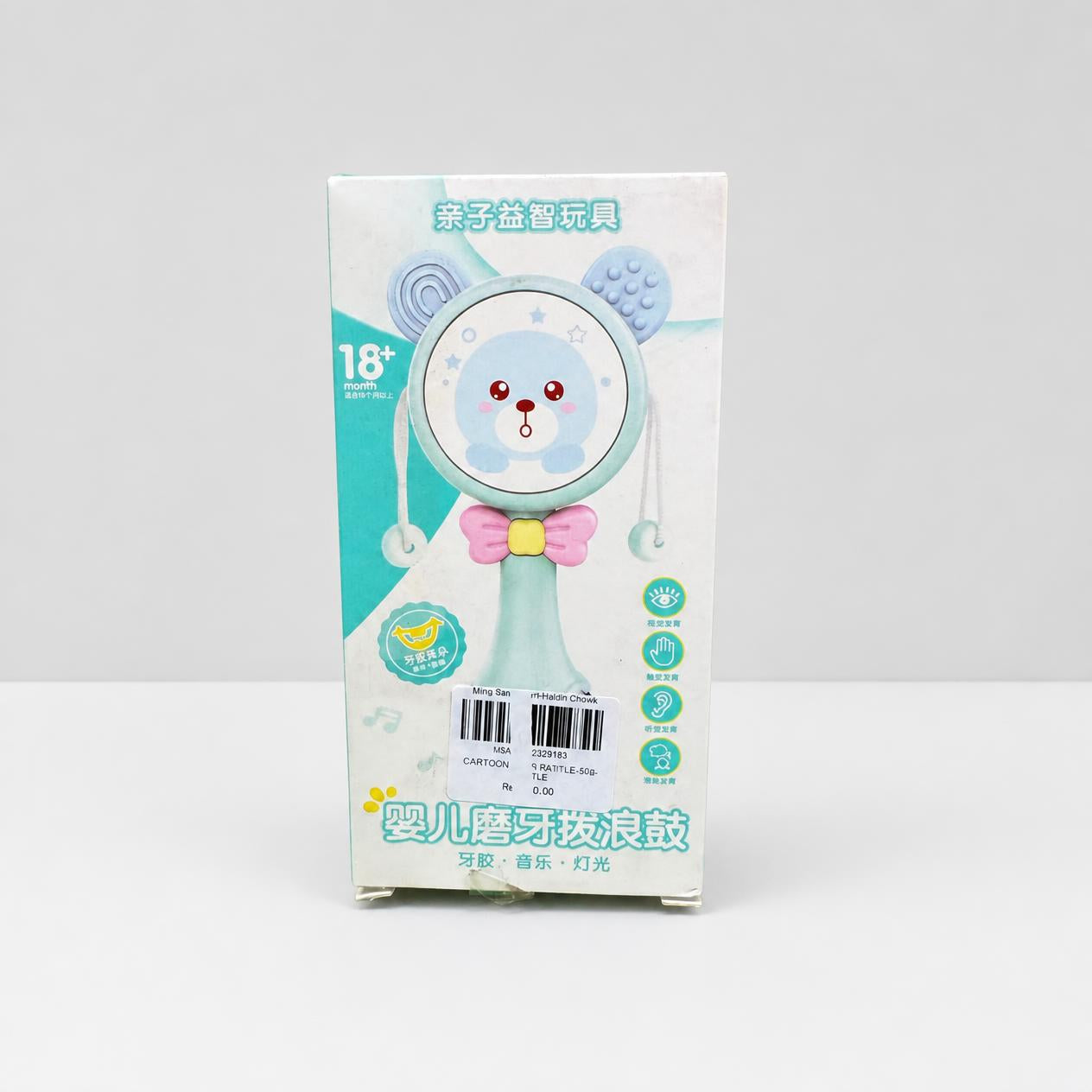 Baby rattle drum box front in mint and white, 18+ month badge and the shop sticker