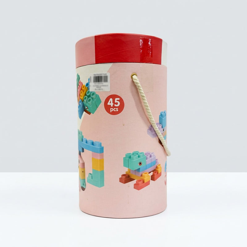 Pink-topped tube alone, with a "45 pcs" badge and a stacked block tower printed on the side
