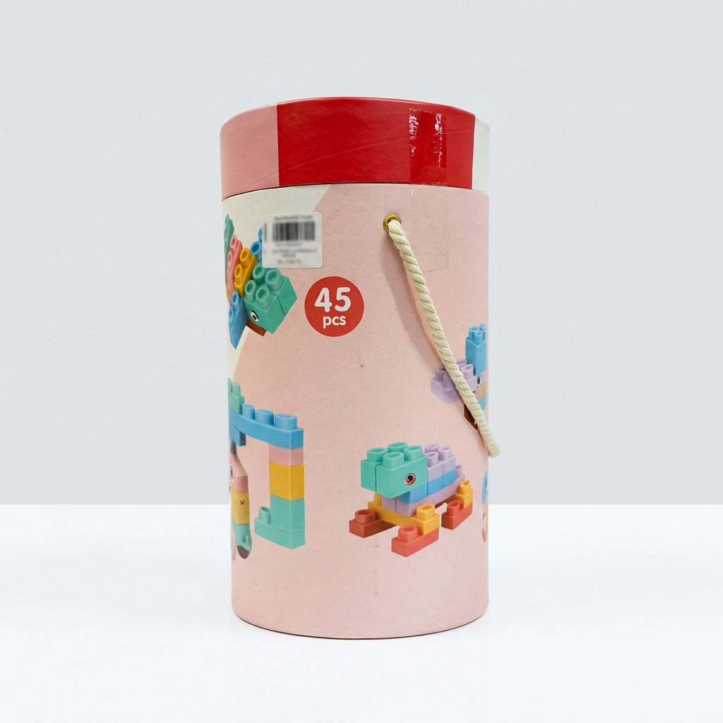 Pink-topped tube alone, with a "45 pcs" badge and a stacked block tower printed on the side