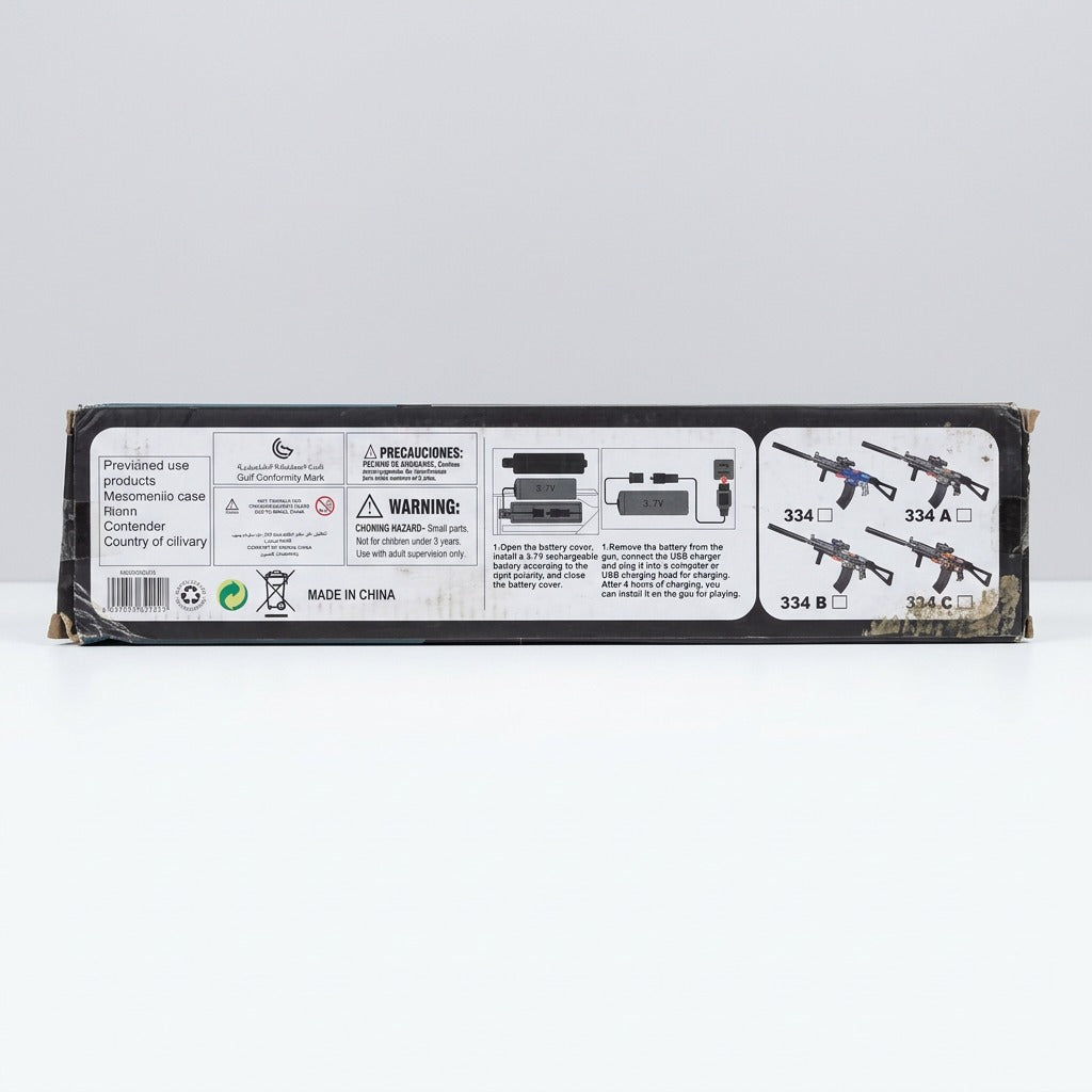 Box side panel showing the assembly diagram and GUN 103CM