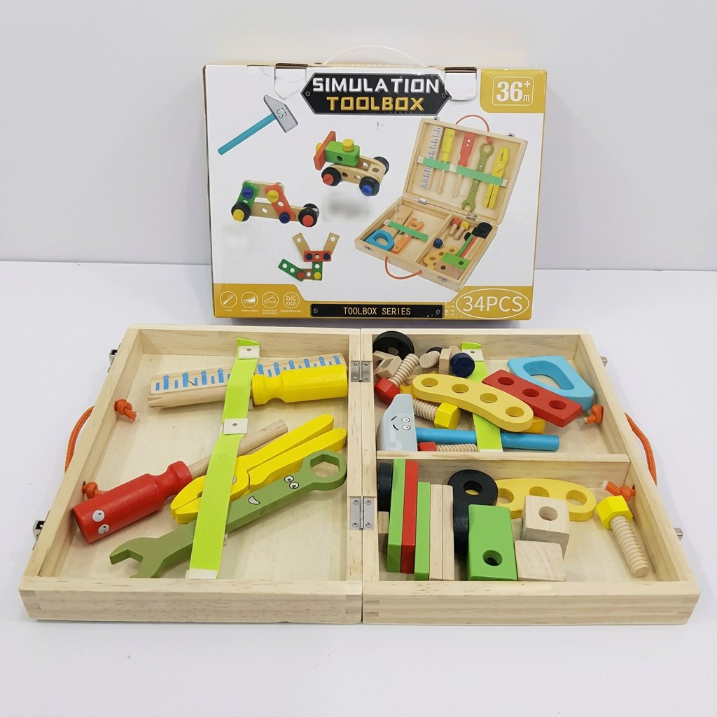 Box front artwork for the Simulation Toolbox, showing the closed wooden case and the three toy vehicles it can build