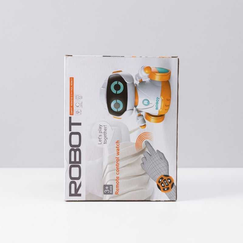 Three-window box front showing the robot's head, the watch remote and the robot's lower body